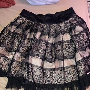 Black and Tan skirt. Brand is Twenty One. Size XS